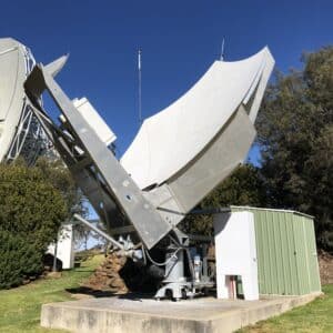 3.8m batwing satellite dish with a green shed next to it